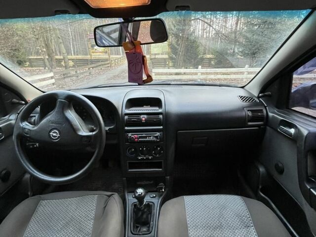 Синий Опель Астра, объемом двигателя 1.6 л и пробегом 342 тыс. км за 3200 $, фото 5 на Automoto.ua