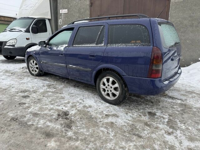 Синий Опель Астра, объемом двигателя 2 л и пробегом 320 тыс. км за 999 $, фото 4 на Automoto.ua