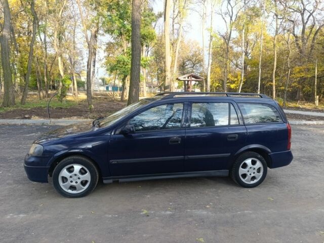 Синій Опель Астра, об'ємом двигуна 2 л та пробігом 310 тис. км за 1600 $, фото 1 на Automoto.ua