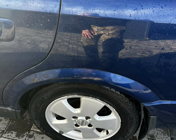 Синий Опель Астра, объемом двигателя 1.6 л и пробегом 260 тыс. км за 4200 $, фото 7 на Automoto.ua