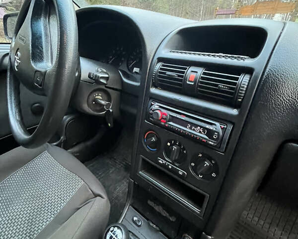 Синий Опель Астра, объемом двигателя 1.6 л и пробегом 341 тыс. км за 3200 $, фото 8 на Automoto.ua