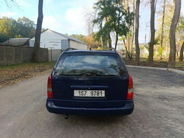 Синій Опель Астра, об'ємом двигуна 2 л та пробігом 310 тис. км за 1600 $, фото 5 на Automoto.ua