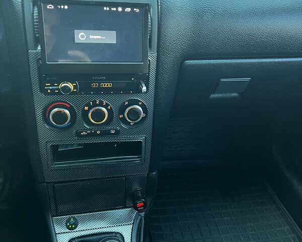 Синий Опель Астра, объемом двигателя 1.6 л и пробегом 260 тыс. км за 4200 $, фото 16 на Automoto.ua