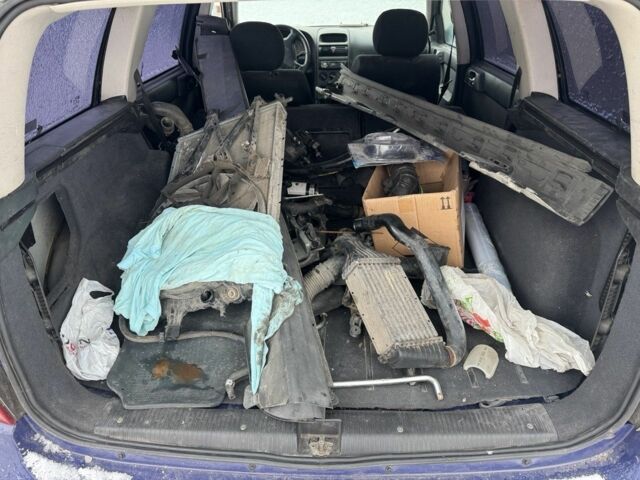 Синий Опель Астра, объемом двигателя 2 л и пробегом 320 тыс. км за 999 $, фото 6 на Automoto.ua