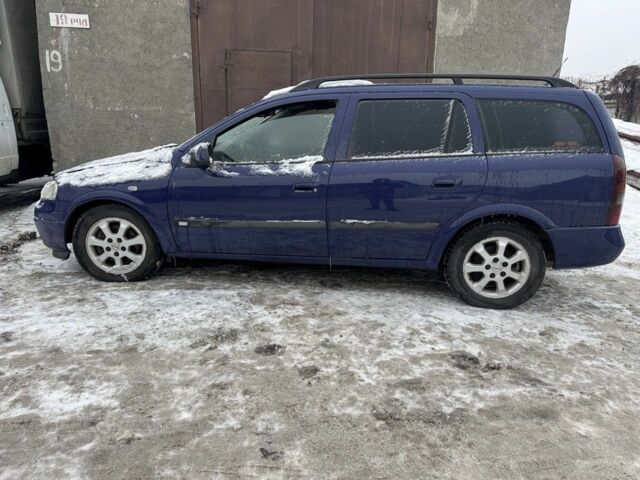 Синий Опель Астра, объемом двигателя 2 л и пробегом 320 тыс. км за 999 $, фото 2 на Automoto.ua