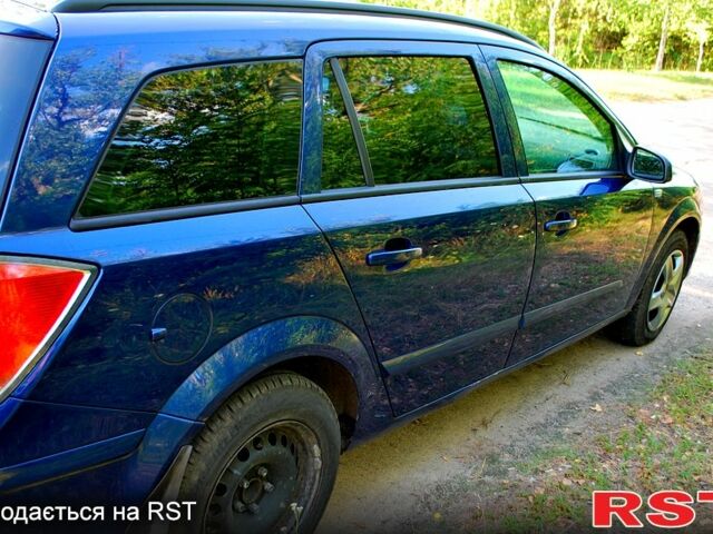 Синий Опель Астра, объемом двигателя 1.7 л и пробегом 375 тыс. км за 4900 $, фото 2 на Automoto.ua