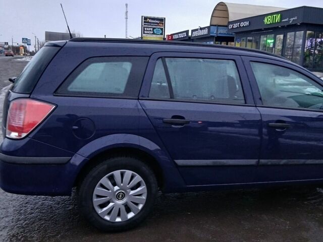 Синій Опель Астра, об'ємом двигуна 1.4 л та пробігом 208 тис. км за 4900 $, фото 5 на Automoto.ua