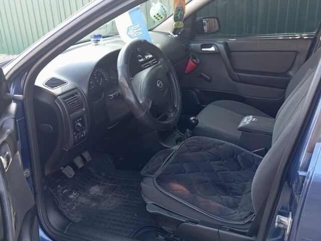 Синій Опель Астра, об'ємом двигуна 1 л та пробігом 260 тис. км за 3400 $, фото 5 на Automoto.ua