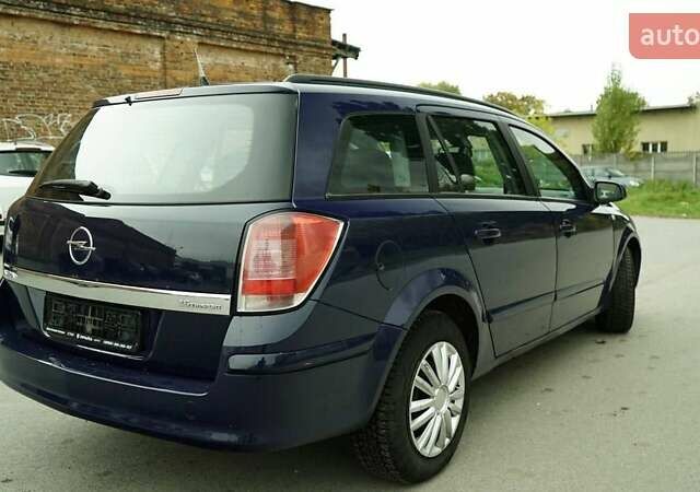 Синий Опель Астра, объемом двигателя 1.6 л и пробегом 240 тыс. км за 3799 $, фото 6 на Automoto.ua