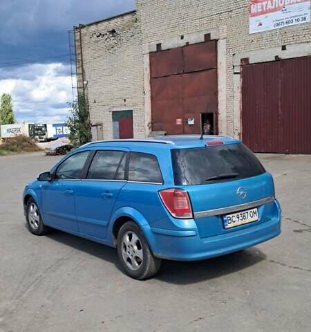 Синий Опель Астра, объемом двигателя 1.8 л и пробегом 308 тыс. км за 3650 $, фото 11 на Automoto.ua