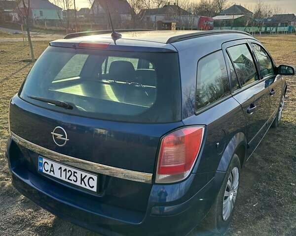 Синий Опель Астра, объемом двигателя 1.6 л и пробегом 242 тыс. км за 4550 $, фото 3 на Automoto.ua