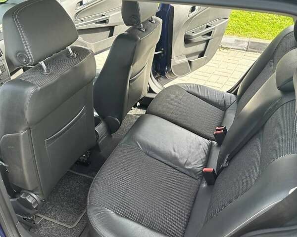 Синий Опель Астра, объемом двигателя 1.7 л и пробегом 280 тыс. км за 4800 $, фото 6 на Automoto.ua