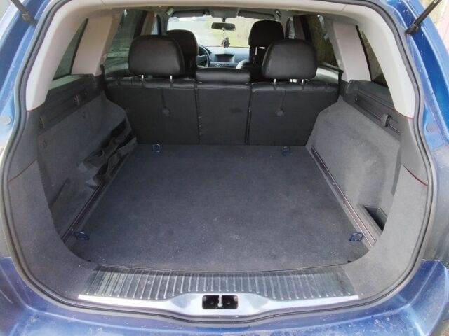 Синий Опель Астра, объемом двигателя 1.6 л и пробегом 195 тыс. км за 5350 $, фото 6 на Automoto.ua