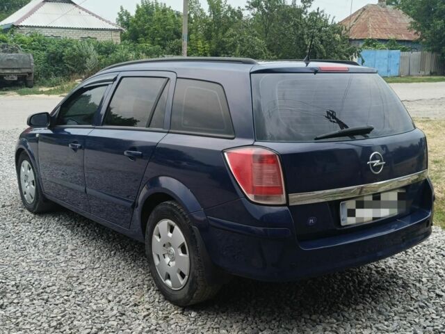 Синий Опель Астра, объемом двигателя 1.9 л и пробегом 340 тыс. км за 3200 $, фото 1 на Automoto.ua