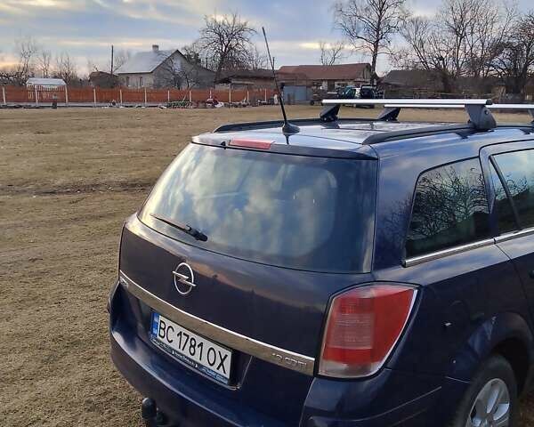 Синий Опель Астра, объемом двигателя 1.9 л и пробегом 299 тыс. км за 4700 $, фото 4 на Automoto.ua