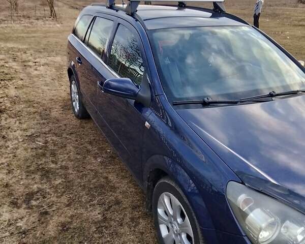 Синий Опель Астра, объемом двигателя 1.9 л и пробегом 299 тыс. км за 4700 $, фото 1 на Automoto.ua