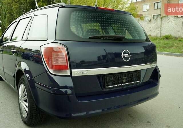 Синий Опель Астра, объемом двигателя 1.6 л и пробегом 240 тыс. км за 3799 $, фото 5 на Automoto.ua
