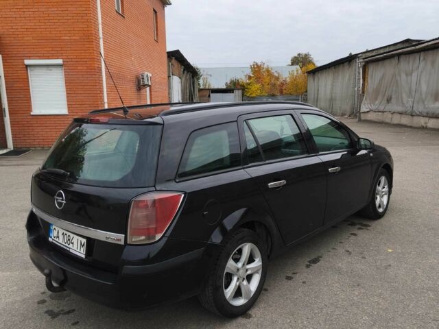 Синий Опель Астра, объемом двигателя 1.7 л и пробегом 339 тыс. км за 4200 $, фото 4 на Automoto.ua