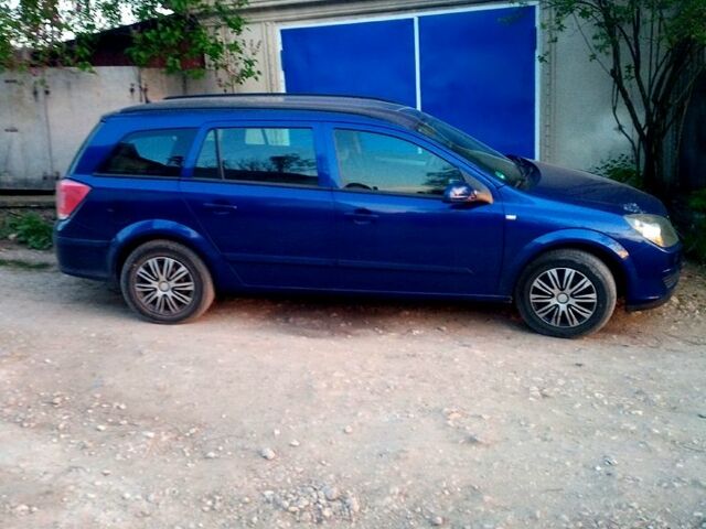 Синий Опель Астра, объемом двигателя 1.8 л и пробегом 203 тыс. км за 5200 $, фото 4 на Automoto.ua