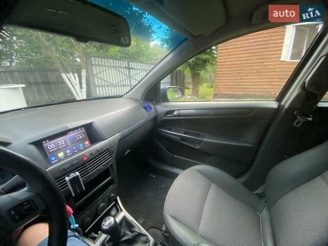 Синий Опель Астра, объемом двигателя 1.9 л и пробегом 275 тыс. км за 5349 $, фото 8 на Automoto.ua