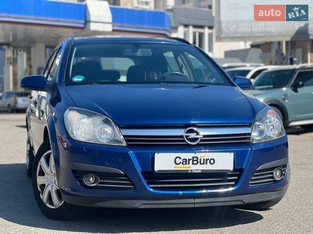 Синий Опель Астра, объемом двигателя 1.6 л и пробегом 280 тыс. км за 5600 $, фото 2 на Automoto.ua