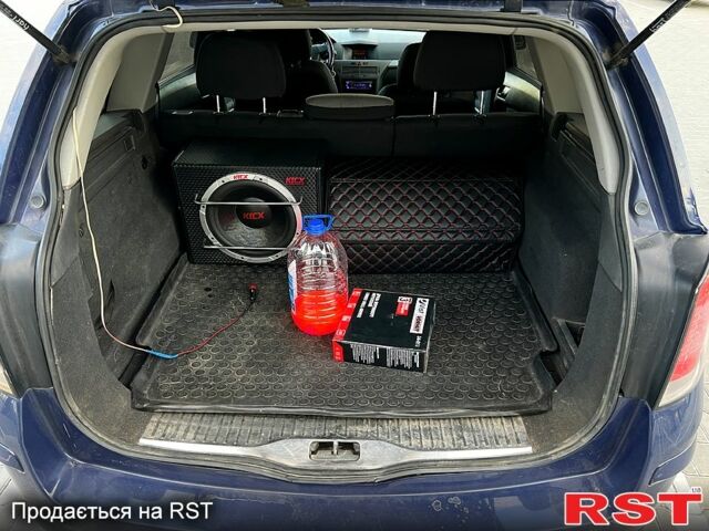 Синий Опель Астра, объемом двигателя 1.9 л и пробегом 320 тыс. км за 5000 $, фото 7 на Automoto.ua