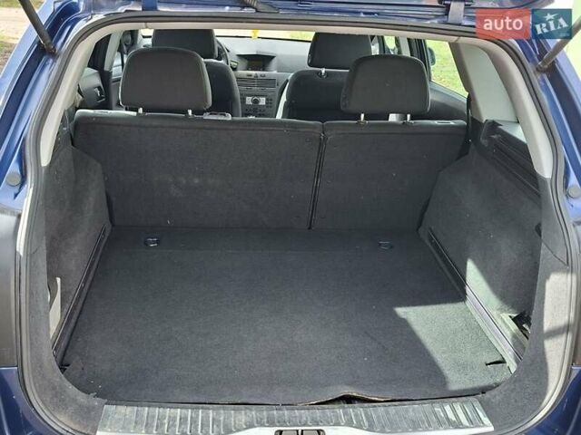 Синий Опель Астра, объемом двигателя 1.69 л и пробегом 235 тыс. км за 4100 $, фото 1 на Automoto.ua