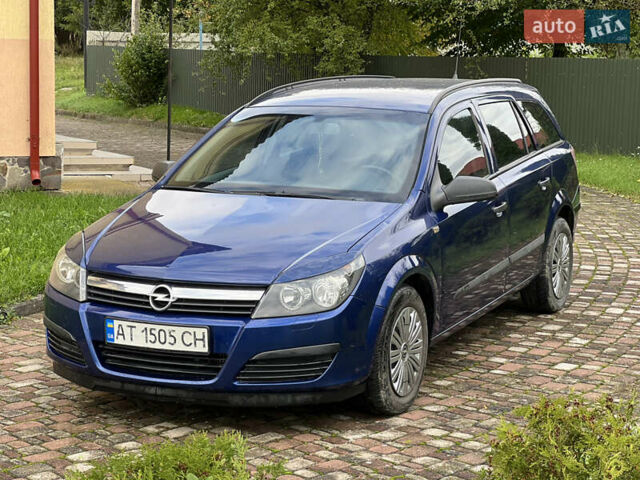 Синий Опель Астра, объемом двигателя 1.25 л и пробегом 399 тыс. км за 4300 $, фото 4 на Automoto.ua