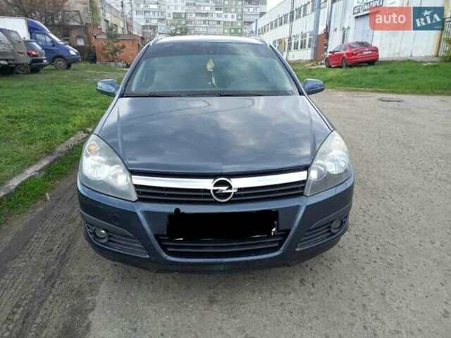 Синий Опель Астра, объемом двигателя 1.8 л и пробегом 240 тыс. км за 5450 $, фото 4 на Automoto.ua