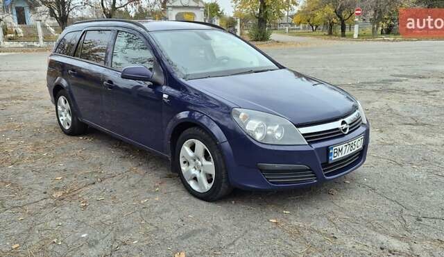 Синий Опель Астра, объемом двигателя 1.3 л и пробегом 370 тыс. км за 3800 $, фото 4 на Automoto.ua