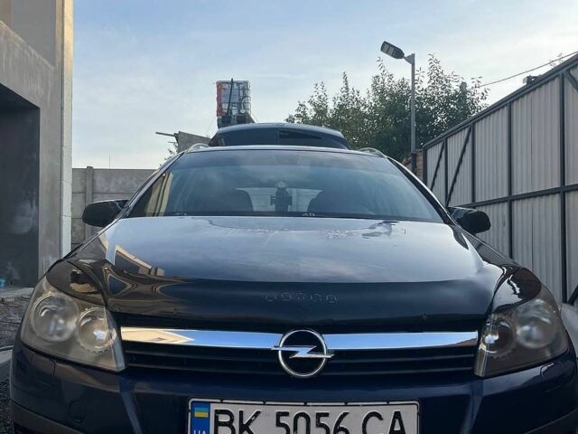 Синій Опель Астра, об'ємом двигуна 1.25 л та пробігом 294 тис. км за 4000 $, фото 12 на Automoto.ua