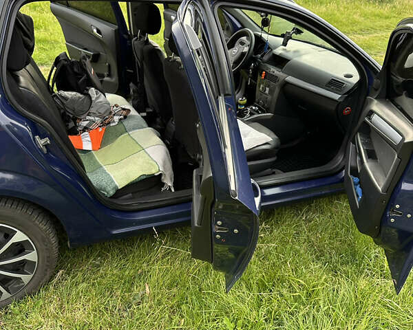 Синий Опель Астра, объемом двигателя 1.69 л и пробегом 330 тыс. км за 3900 $, фото 11 на Automoto.ua