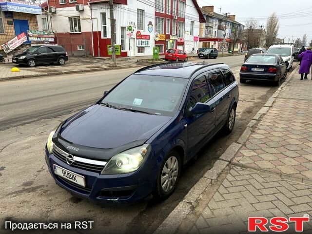 Синий Опель Астра, объемом двигателя 1.9 л и пробегом 320 тыс. км за 5000 $, фото 3 на Automoto.ua
