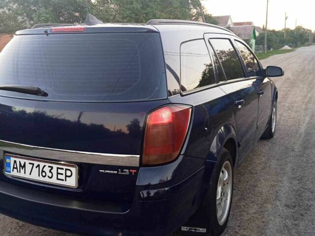 Синій Опель Астра, об'ємом двигуна 1.3 л та пробігом 248 тис. км за 3650 $, фото 4 на Automoto.ua