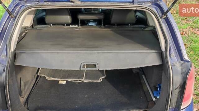 Синій Опель Астра, об'ємом двигуна 1.25 л та пробігом 321 тис. км за 3800 $, фото 13 на Automoto.ua