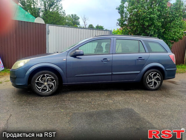 Синий Опель Астра, объемом двигателя 1.4 л и пробегом 375 тыс. км за 4100 $, фото 2 на Automoto.ua