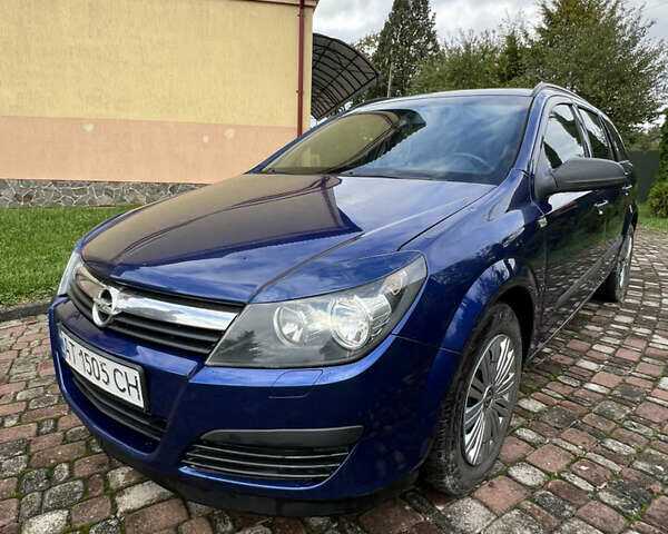 Синий Опель Астра, объемом двигателя 1.25 л и пробегом 399 тыс. км за 4300 $, фото 14 на Automoto.ua