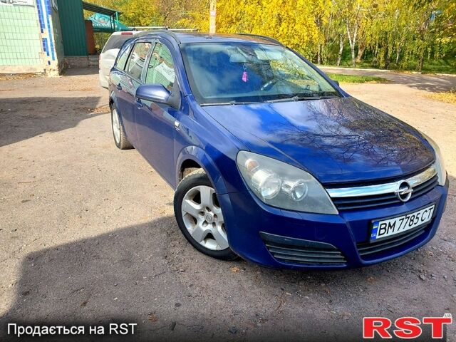 Синий Опель Астра, объемом двигателя 1.2 л и пробегом 330 тыс. км за 4200 $, фото 3 на Automoto.ua