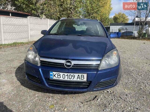 Синий Опель Астра, объемом двигателя 1.2 л и пробегом 338 тыс. км за 3800 $, фото 4 на Automoto.ua