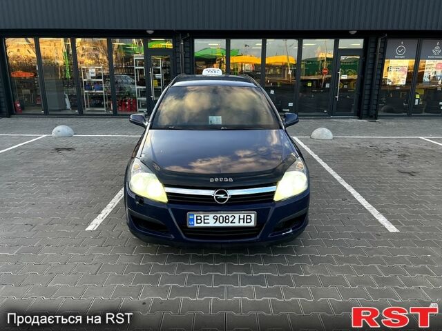 Синий Опель Астра, объемом двигателя 1.9 л и пробегом 320 тыс. км за 5000 $, фото 8 на Automoto.ua