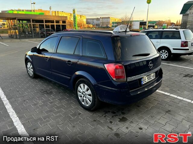 Синий Опель Астра, объемом двигателя 1.9 л и пробегом 320 тыс. км за 5000 $, фото 4 на Automoto.ua