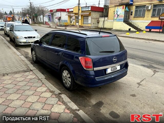 Синий Опель Астра, объемом двигателя 1.9 л и пробегом 320 тыс. км за 5000 $, фото 10 на Automoto.ua