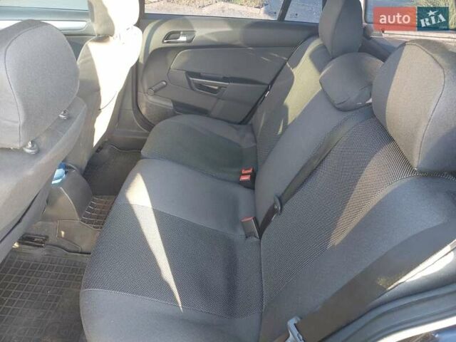 Синий Опель Астра, объемом двигателя 1.8 л и пробегом 253 тыс. км за 4900 $, фото 8 на Automoto.ua