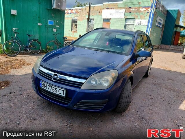 Синий Опель Астра, объемом двигателя 1.2 л и пробегом 330 тыс. км за 4200 $, фото 1 на Automoto.ua