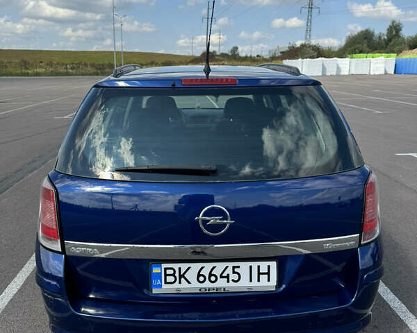 Синий Опель Астра, объемом двигателя 1.6 л и пробегом 262 тыс. км за 4200 $, фото 4 на Automoto.ua