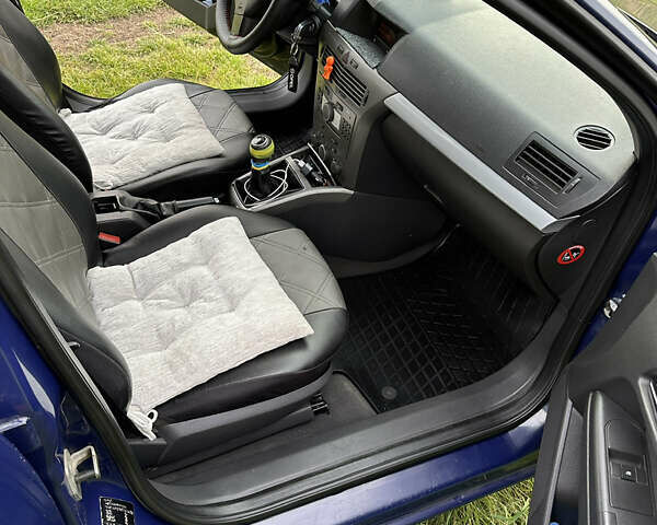 Синий Опель Астра, объемом двигателя 1.69 л и пробегом 330 тыс. км за 3900 $, фото 4 на Automoto.ua