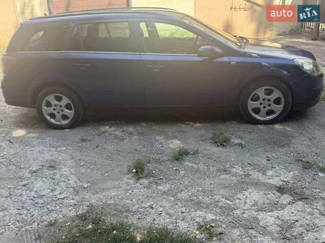 Синій Опель Астра, об'ємом двигуна 1.9 л та пробігом 330 тис. км за 3300 $, фото 4 на Automoto.ua