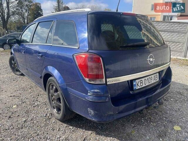 Синий Опель Астра, объемом двигателя 1.2 л и пробегом 338 тыс. км за 3800 $, фото 3 на Automoto.ua