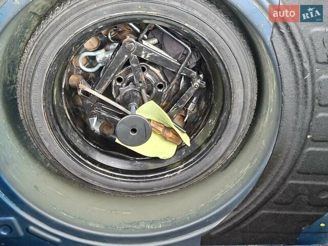 Синий Опель Астра, объемом двигателя 1.69 л и пробегом 235 тыс. км за 4100 $, фото 6 на Automoto.ua