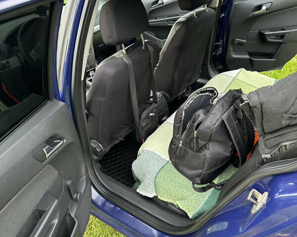 Синий Опель Астра, объемом двигателя 1.69 л и пробегом 330 тыс. км за 3900 $, фото 9 на Automoto.ua